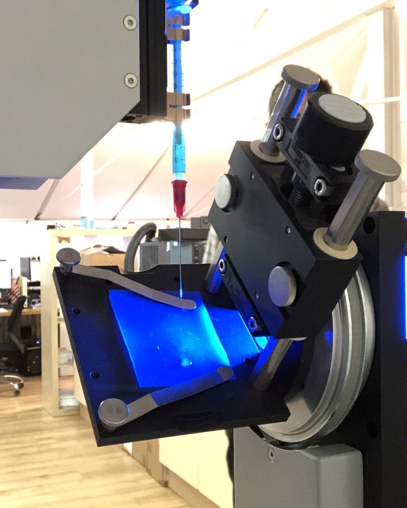 Measuring dynamic contact angle with tilting plate drop shape analysis