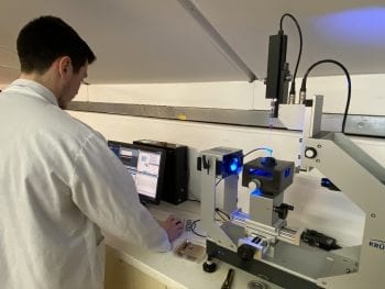 Our lab technician working on the drop shape analyser.